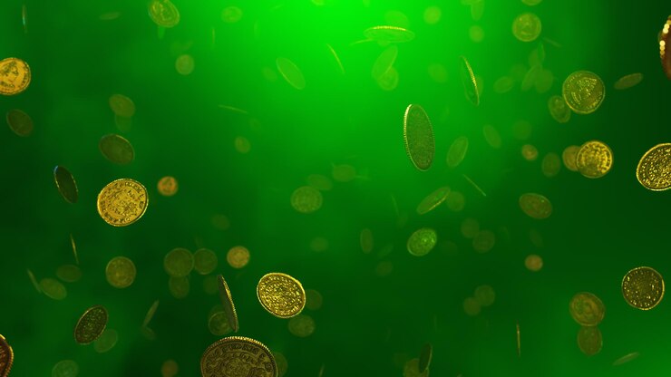 A green background with some gold coins falling